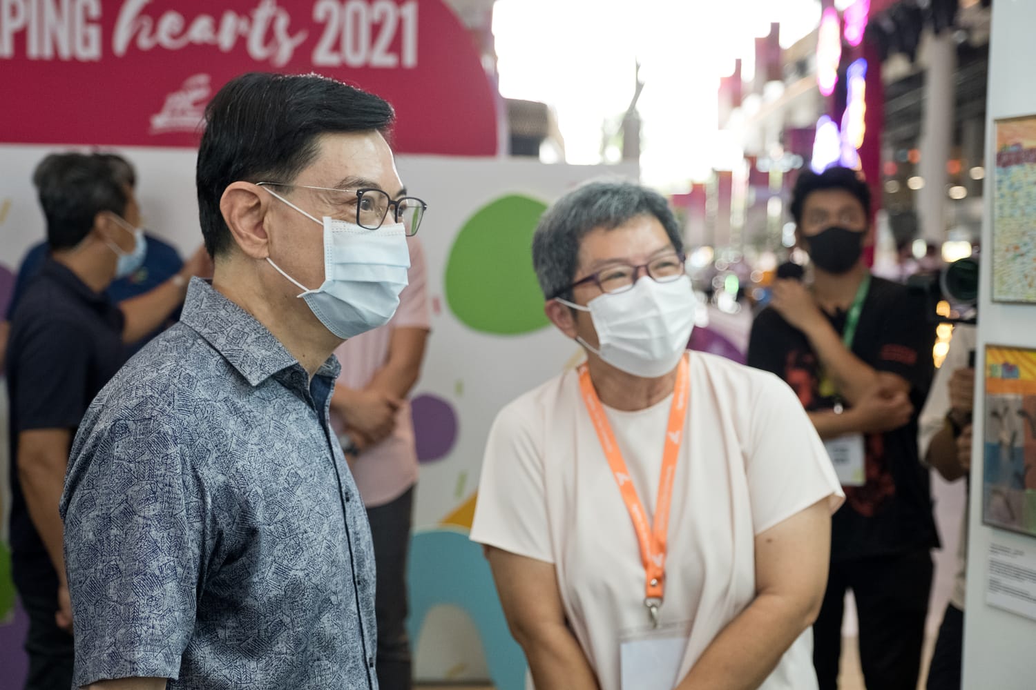 two people wearing mask